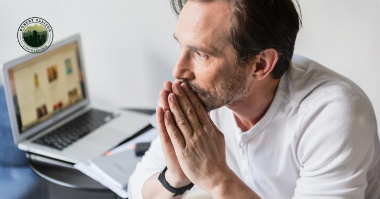Sad, thoughtful man looking lensively.