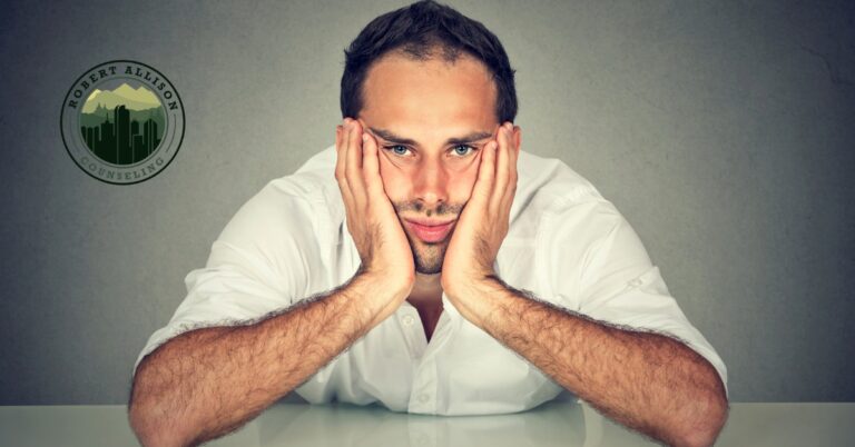 man looking disinterested